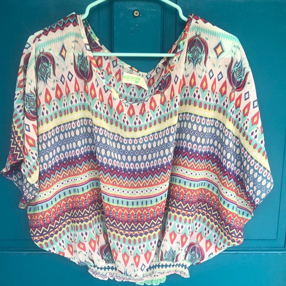 Gently worn sheer banded waist top